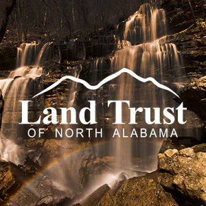 Image of waterfall that reads "Land Trust of North Alabama"