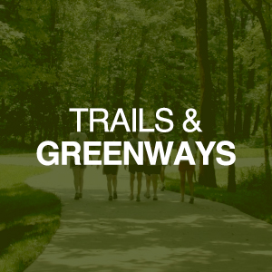 Image that reads "Trails and Greenways"