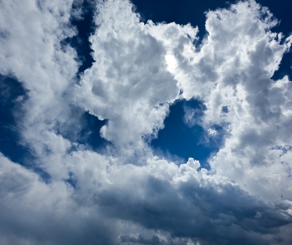 Clouds parting for the sun.