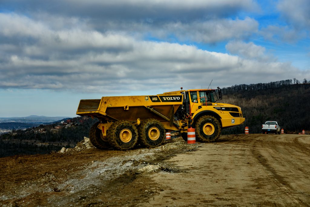 Dump truck against a blue sky