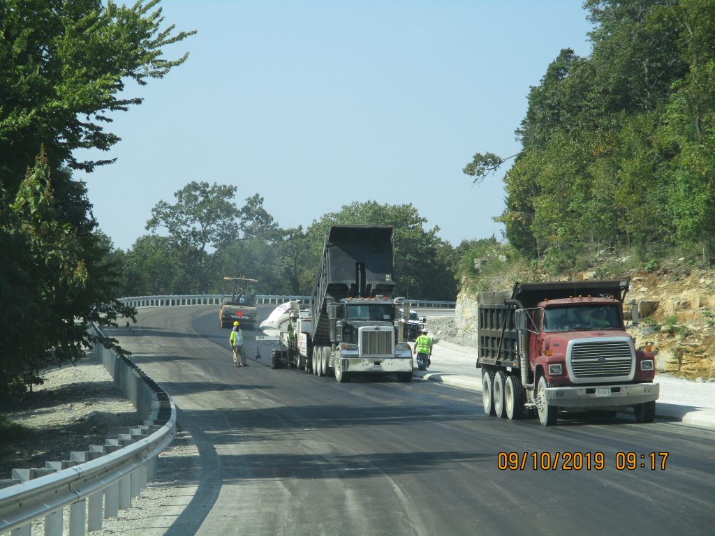 Trucks working on Cecil Ashburn