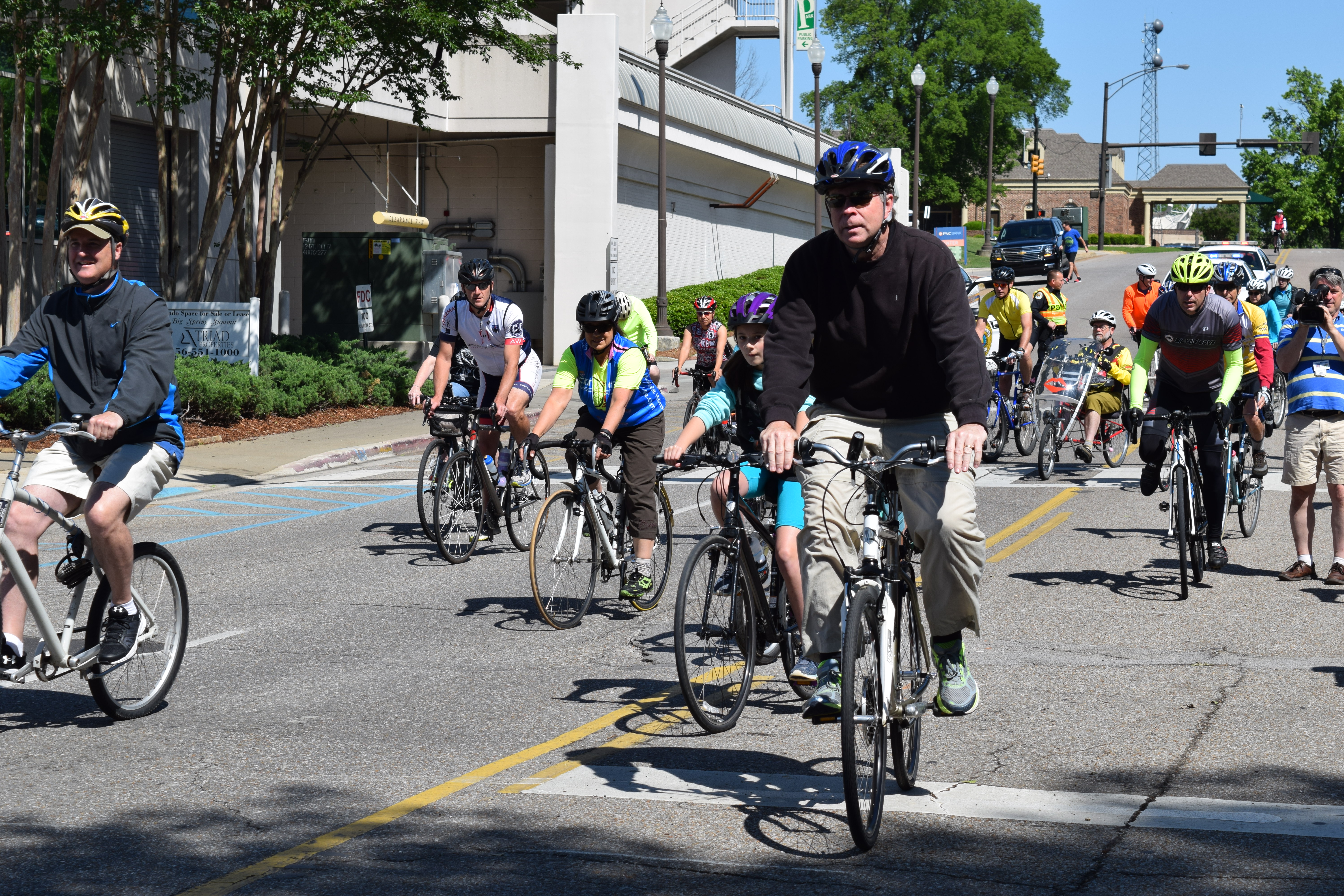 mayor battle rides a bike with families