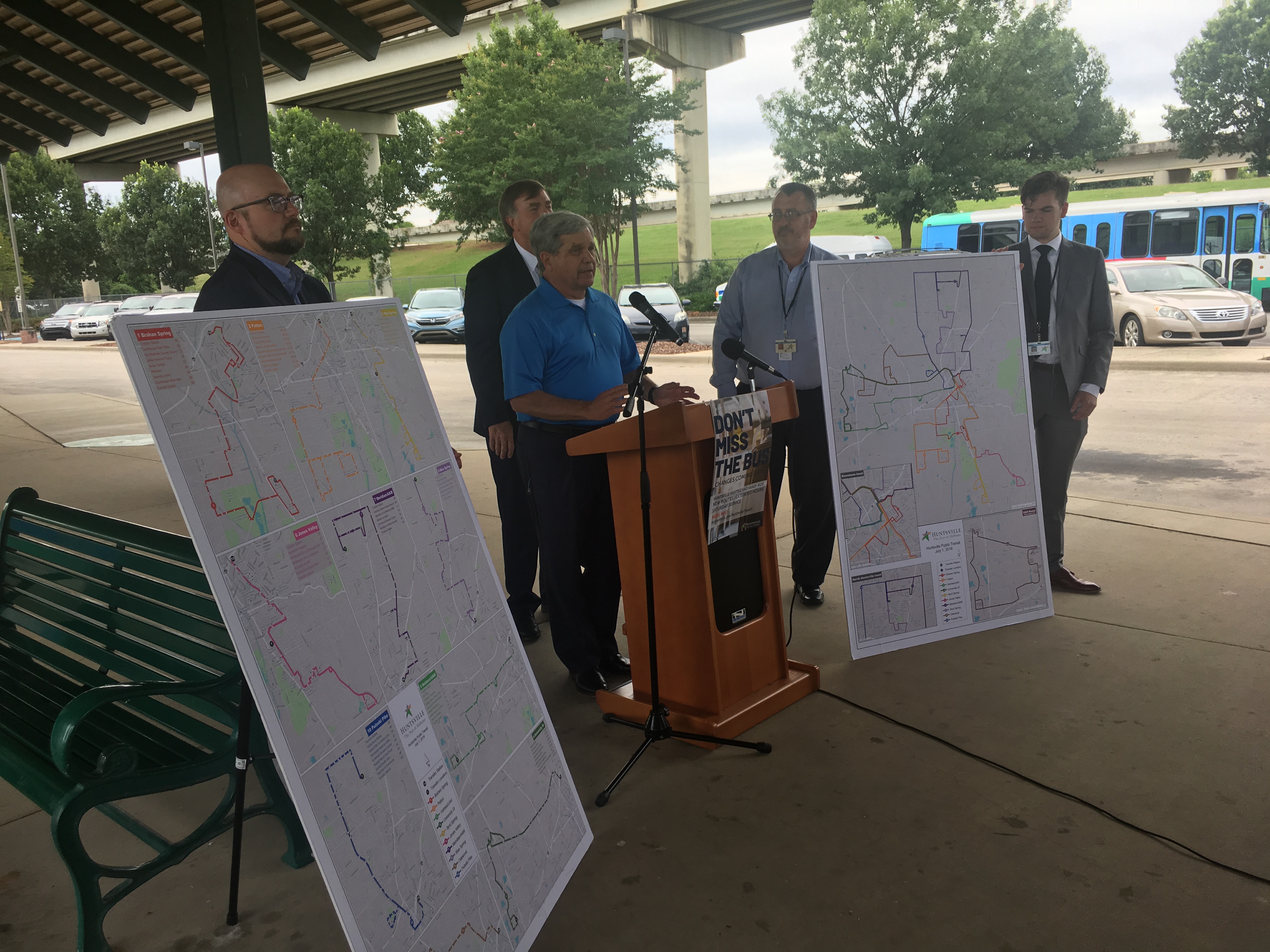 picture of Mayor Battle and Transit leaders at the downtown transfer station for a news conference