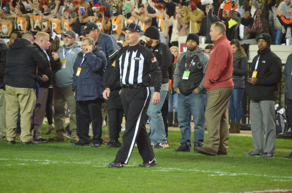 pic of Mark Russell in referee uniform working a high school football game