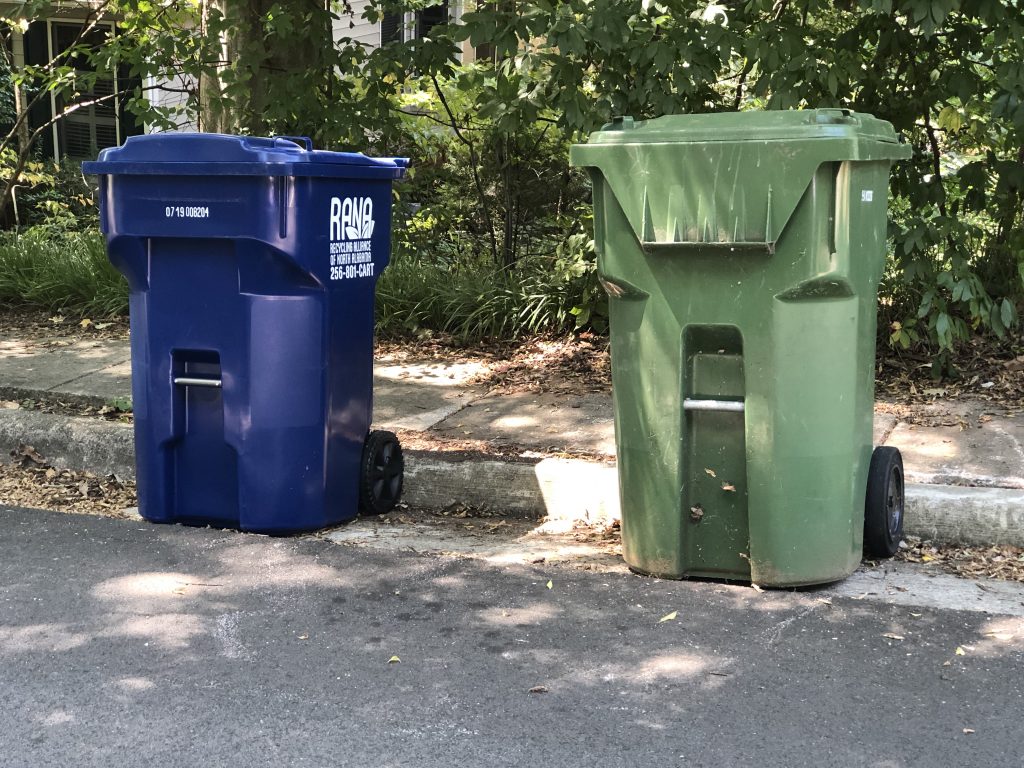 Photo of trash cans placed curbside