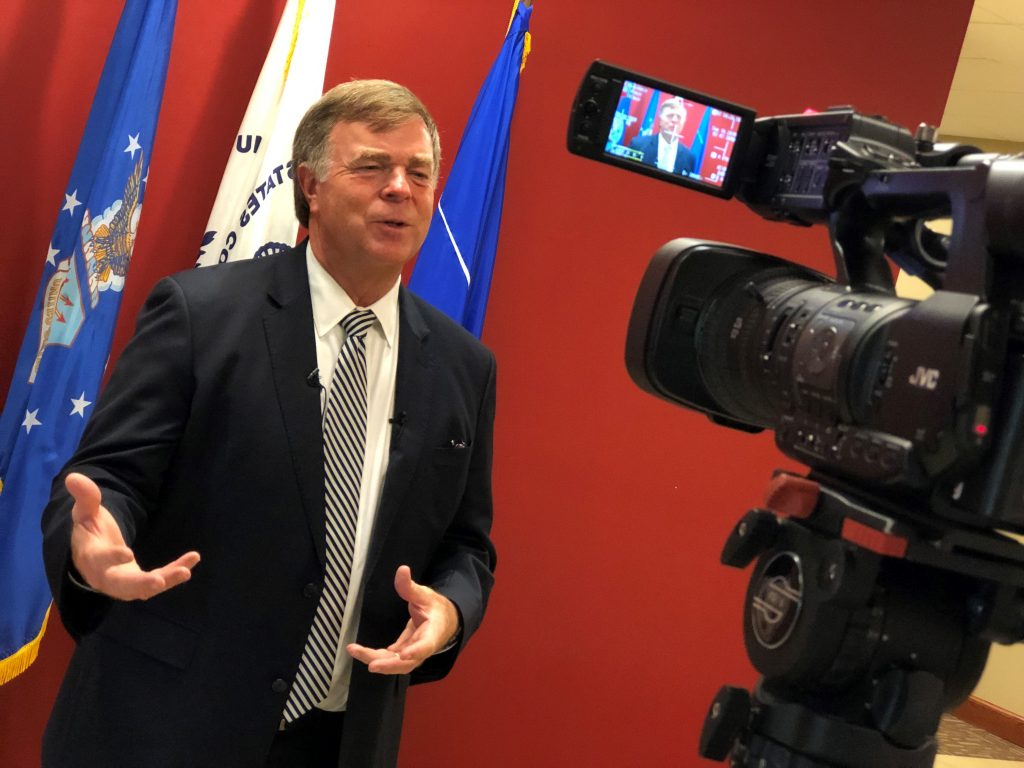 Photo of Mayor Battle being interviewed by TV reporter
