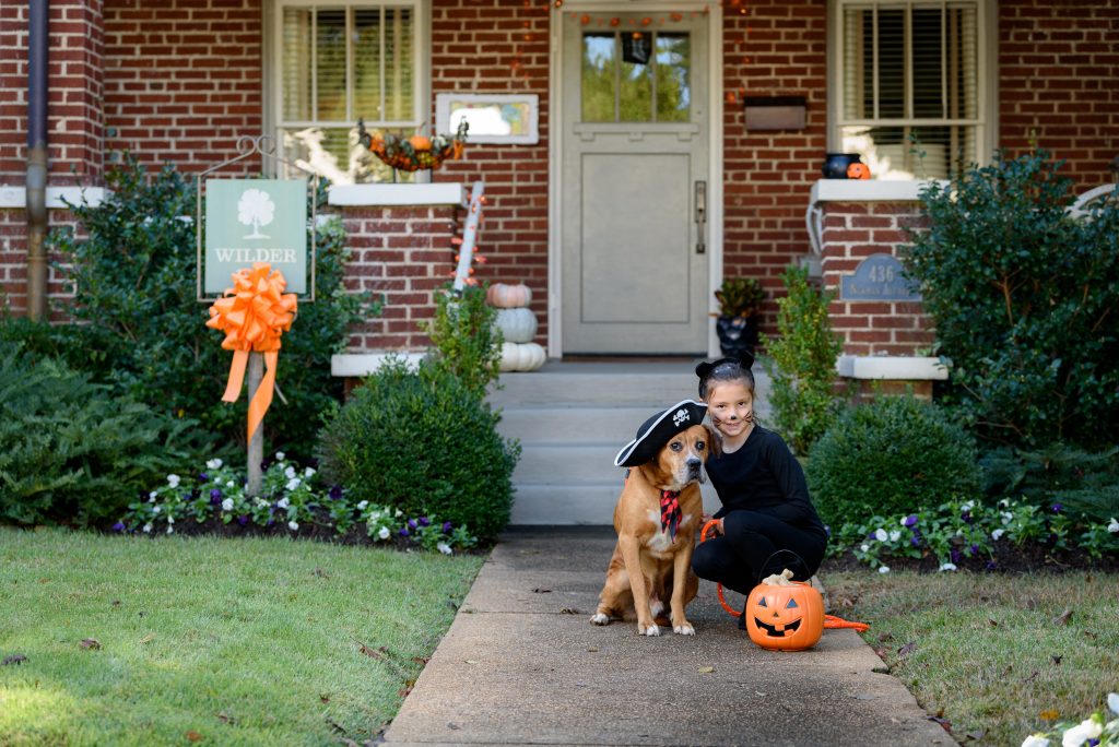 Pictured at “The Wilder House” on Newman Avenue – Adoptable Dog Hulu and Huntsville Animal Services Youth Volunteer Lyra