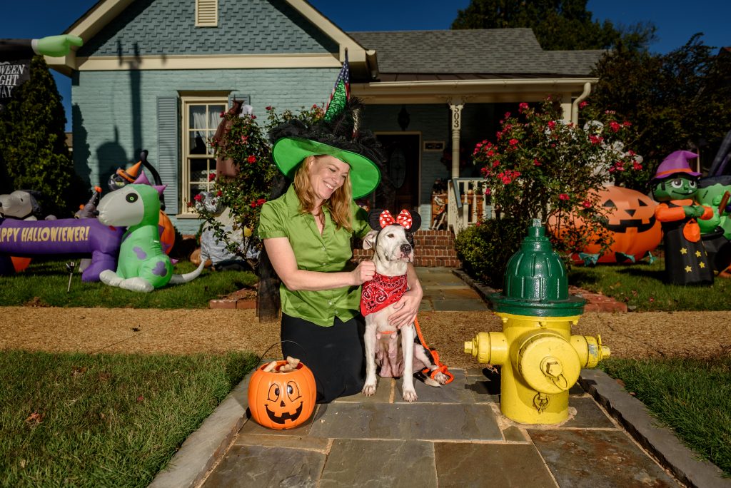 Pictured at the “Bernstein-Batt House” on Clinton Avenue – Adoptable Dog Truvy and Huntsville Animal Services Lead Care Attendant Kelly