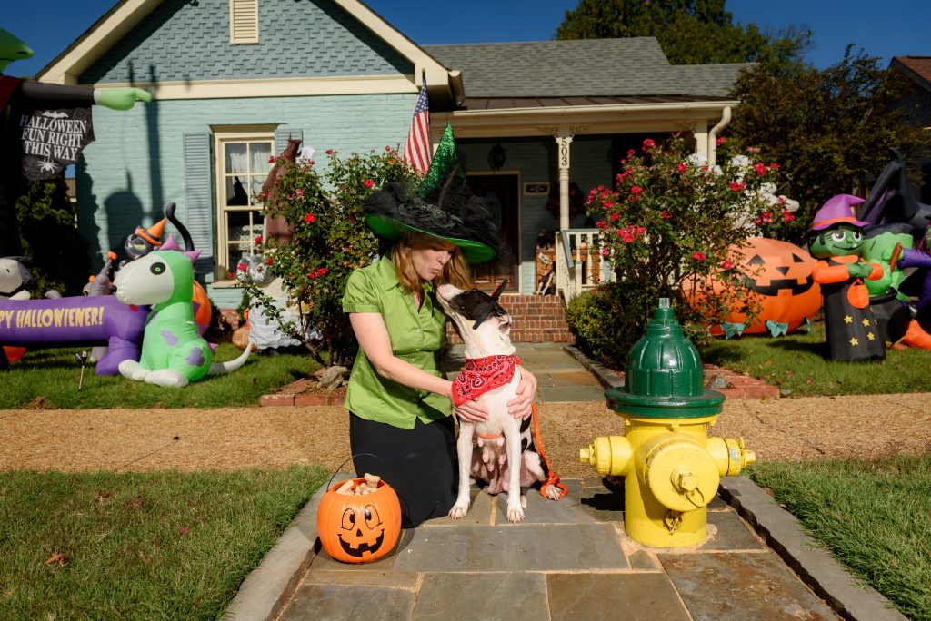 Pictured at the “Bernstein-Batt House” on Clinton Avenue – Adoptable Dog Truvy and Huntsville Animal Services Lead Care Attendant Kelly