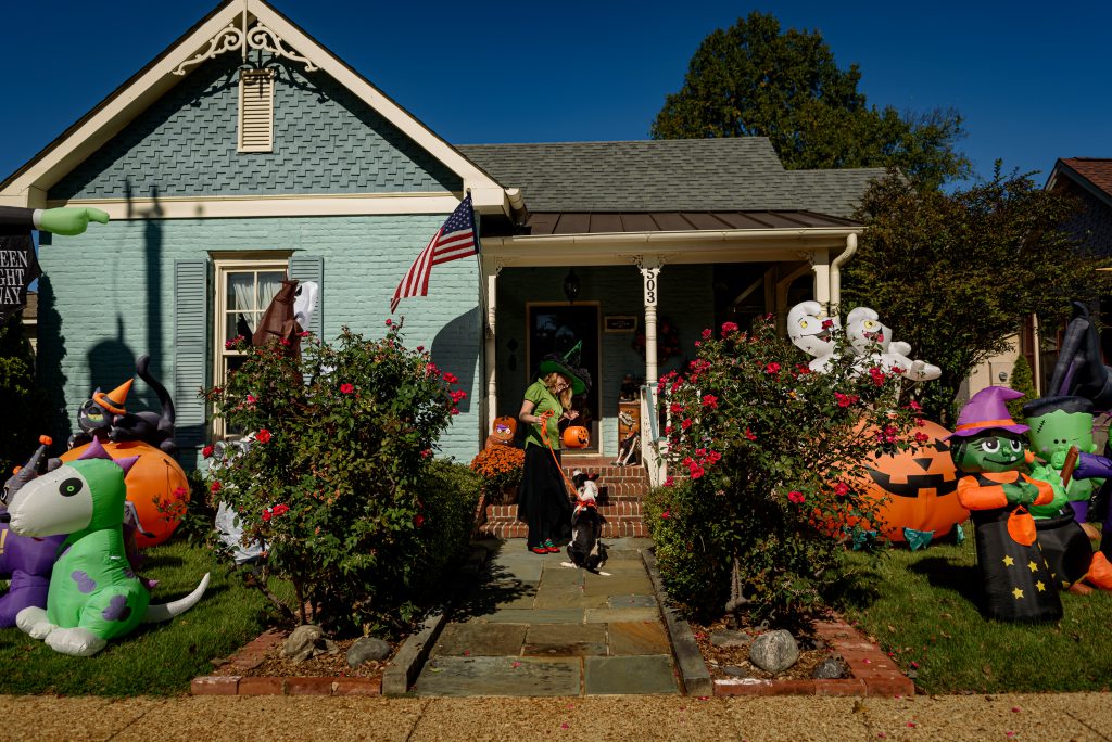 Pictured at the “Bernstein-Batt House” on Clinton Avenue – Adoptable Dog Truvy and Huntsville Animal Services Lead Care Attendant Kelly