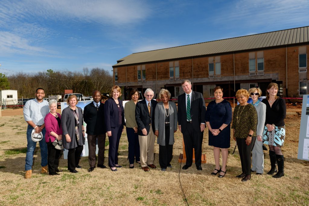 Photo of Mayor Battle, Council President Devyn Keith and special guests in front of the new North Huntsville Library construction project