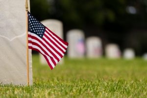 photo of American flags at the graves of soldiers