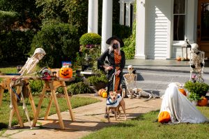 Dog and woman at historic home 