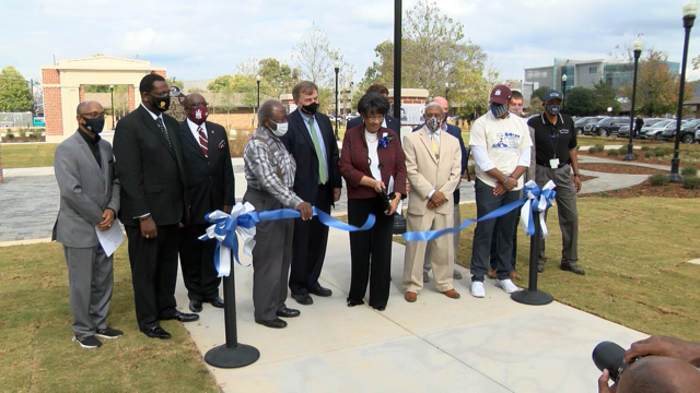 Mayor Battle. Brenda Chunn, and other leaders cut ribbon for Councill Memorial Park