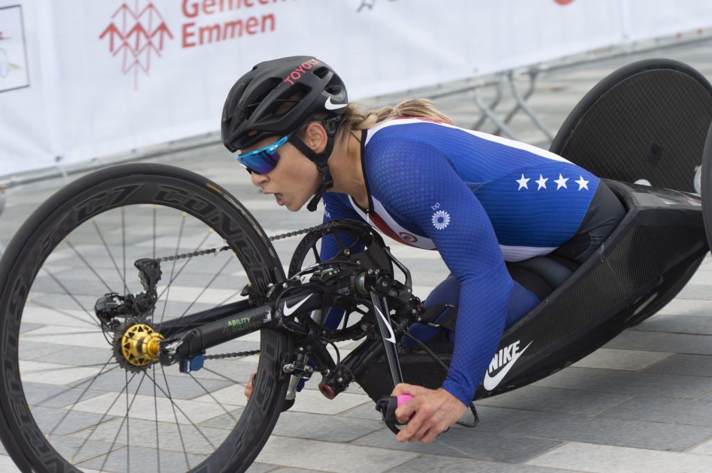 photo of paralympic cyclist in a race