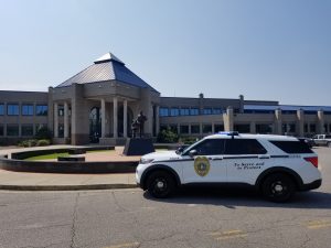 police suv sitting in front of the public safety complex