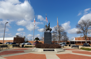The Buffalo Solider Memorial in Huntsville during the day time under partly cloudy skies.