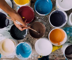 aerial view of different colored cans of paint