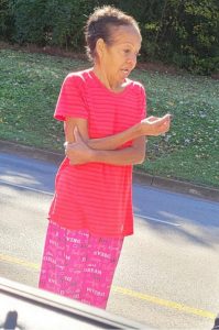 Aiba Troncoso wearing pajamas standing in the roadway