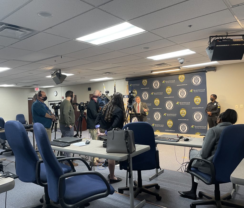 Huntsville Police Chief McMurray stands in front of the podium and addresses all the media at a news conference at the police department.