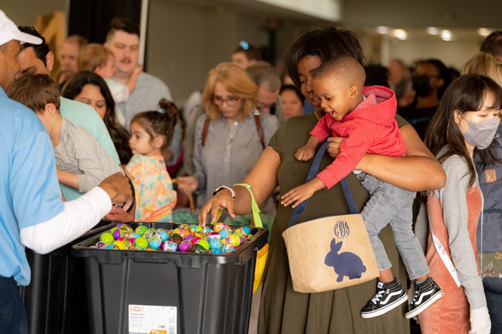 A child picks out Easter Eggs at the inaugural Eggstravaganza in April.