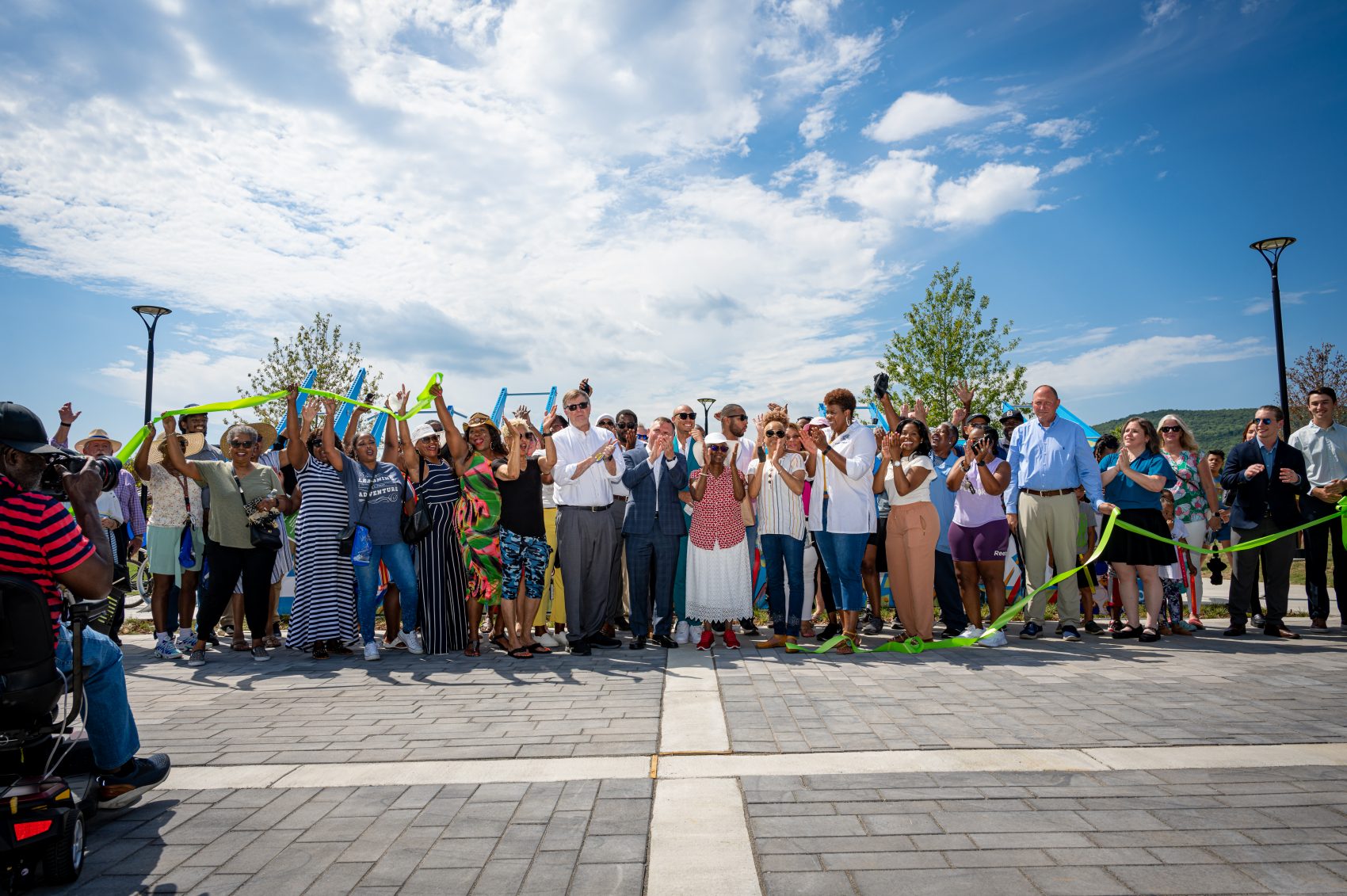 Local leaders and citizens cut the green ribbon on the new Legacy Park in Northwest Huntsville.