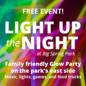A graphic announces Light Up the Night at Big Spring Park on July 21, 2023.