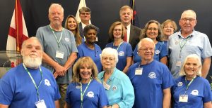 Members of the City of Huntsville's Beautification Board pose for a photo with Mayor Tommy Battle and members of the City's Green Team.