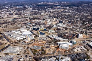 An aerial shot of Downtown Huntsville as captured in January 2024. There are numerous buildings and major roads visible. It is primarily focused on the downtown and includes many major landmarks, including the Von Braun Center and City hall.