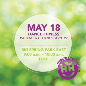 Blurry green grass background with a white transparent circle in the center with the following text: May 18, Dance Fitness with M.E.R.C. Fitness Asylum, Big Spring Park, 9:00 a.m. to 10:00 a.m., FREE, with the Health Huntsville logo in bottom right corner