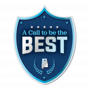 A blue shield with a light blue outline with the words "A Call to be the Best" in the middle along with an image of the state of Alabama. 