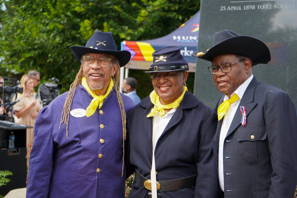 Photo of three African American Buffalo Soldiers re-enactors in uniform