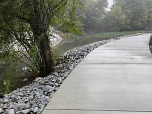 concrete walking path in scenic park
