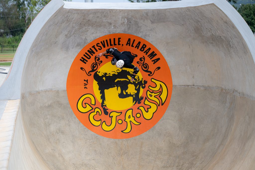 Person preforming a skateboard trick at Get-A-Way Skatepark.