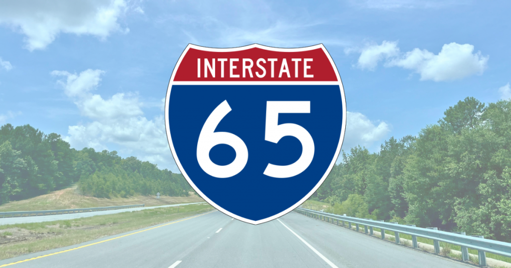 Interstate 65 marker overlaid on top of photo of interstate 65