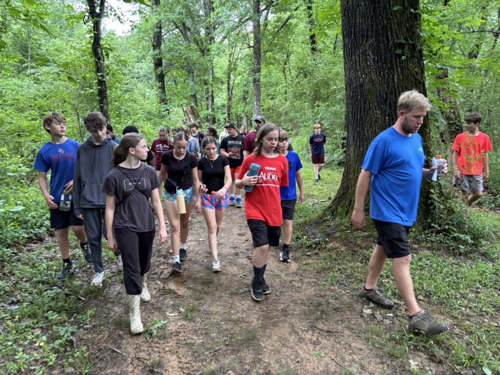 Middle school students on a nature hike with Green Team ambassadors.