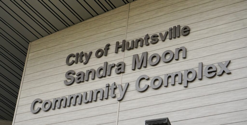exterior signage on building that says City of Huntsville Sandra Moon Community Complex