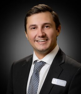 portrait shot of man in dark jacket and tie