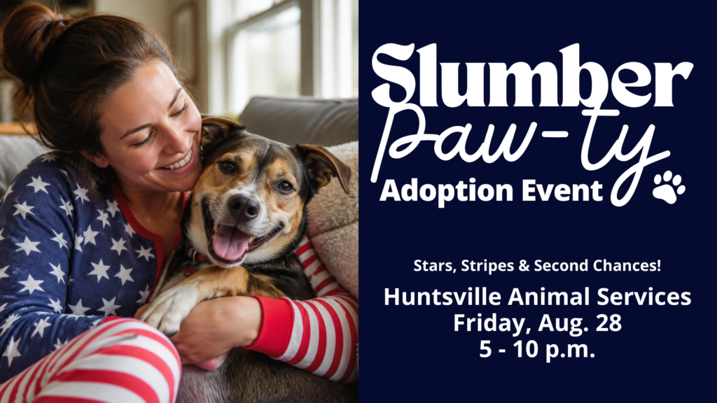 In a promotional event ad for an animal adoption event, a woman wearing red, white and blue flag pajamas snuggles with a cute brown and black dog in her lap while sitting on a couch.