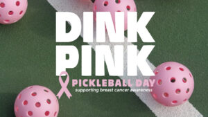 Graphic showing several pink pickleballs on a green court surface with the large text “DINK PINK.” Below, smaller text reads “Pickleball Day” and “supporting breast cancer awareness,” along with a pink ribbon icon.