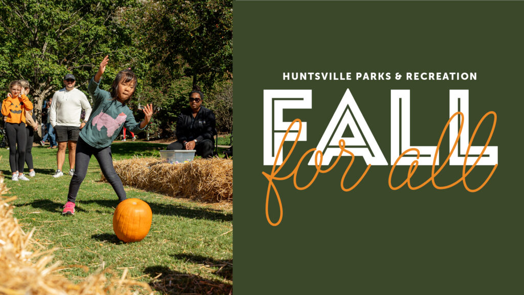 People at an outdoor fall event watch a child roll a pumpkin along a hay-lined path, with “Huntsville Parks & Recreation — Fall for All” text on the right.